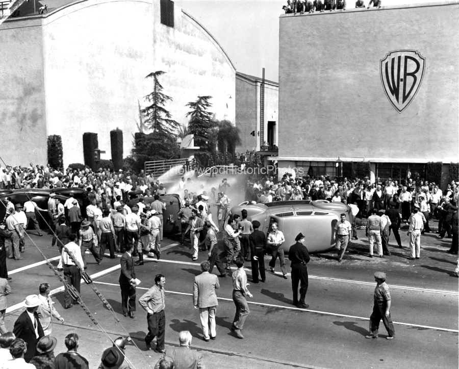Burbank 1945 2 Warner Bros. gates as rioters of Studio Unions go on six month strike of set decorators known as Hollywood Black Friday wm.jpg